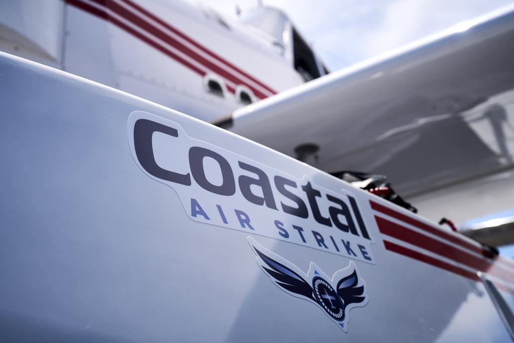 Coastal Air Strike logo on aircraft float